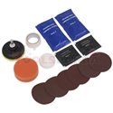 Headlamp recovery tool, including a polishing paste, abrasive paper, a sponge, a Velcro-fastened disc with a pin, masking tape, 
